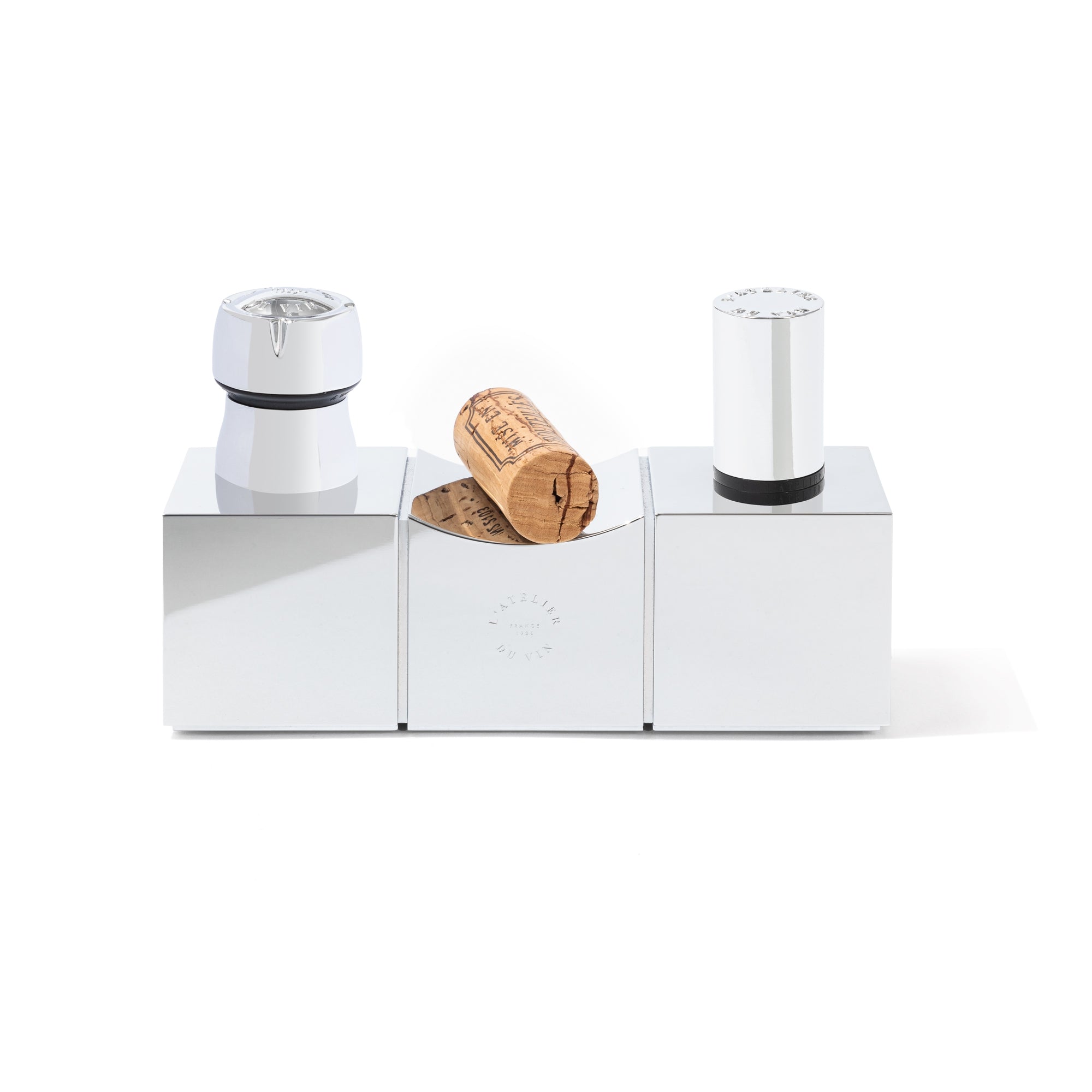 Set de tapones de vino L'Atelier du Vin Bouchons Millésimes con accesorios sobre cajas espejo