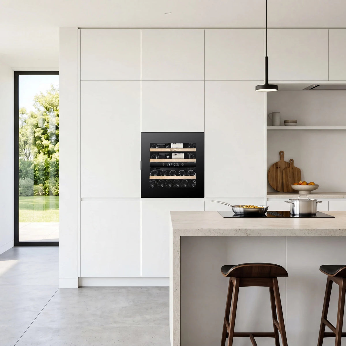 Le Chai LT2BI25H60A 25-bottle wine cooler, built into a column in a kitchen, with the wooden shelves without front.