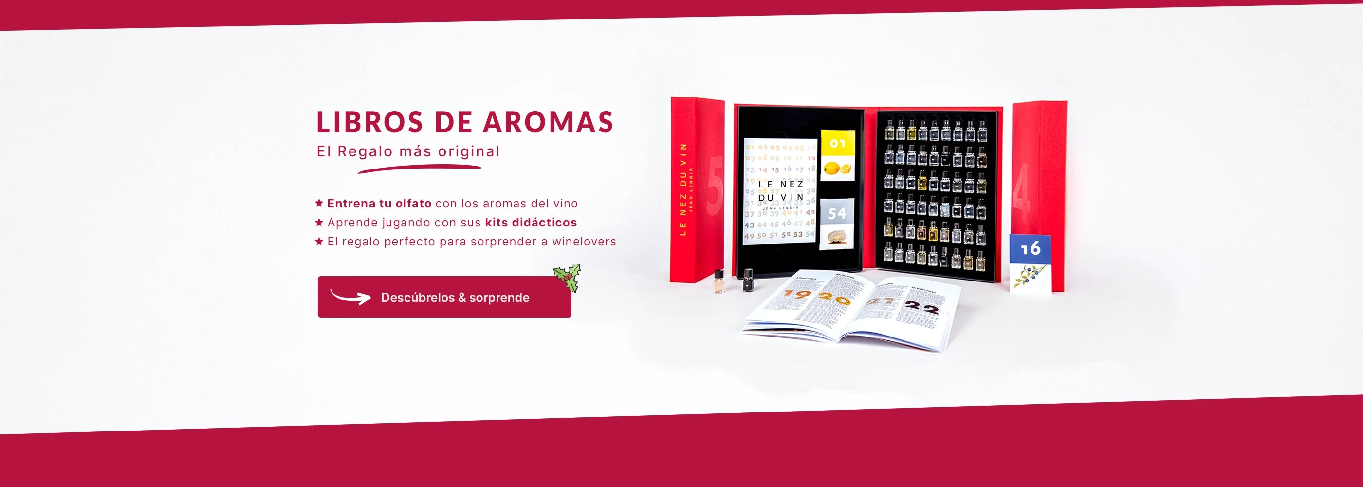 Banner promocional de los “Libros de Aromas Le Nez du Vin”, mostrando una elegante caja roja abierta con frascos aromáticos y un libro explicativo. A la izquierda, texto destacado que invita a entrenar el olfato con aromas del vino y aprender con kits didácticos. Botón navideño: “Descúbrelos & sorprende”.
