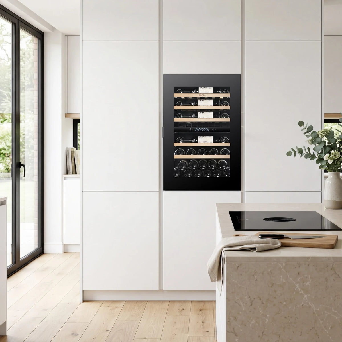 Le Chai LT2BI44H88A 44-bottle wine cooler, built into a column in a kitchen, with the wooden shelves without front.